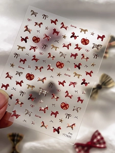 Detail of YT7695 nail stickers featuring retro plaid horses, stars, and apple patterns