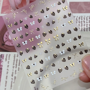 Sweet strawberry and golden bow nail art stickers with metallic finish on translucent backing