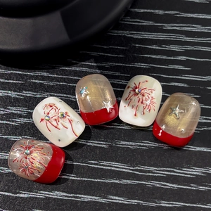 Fireworks theme press-on nails set with red and white colors and sparkling rhinestones