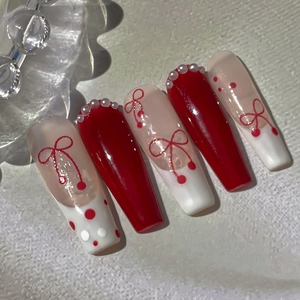 Red bow and cherry embossed long ballerina press-on nails with white pearl accents