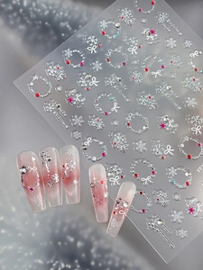 5D Christmas nail stickers with snowflakes and wreaths on pink gradient press-on nails