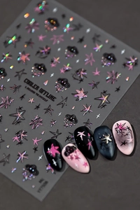 Detail of 3D embossed nail art stickers with pink holographic star and cloud patterns