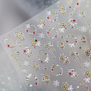 Winter nail stickers with silver snowflakes and festive 3D garland ornaments