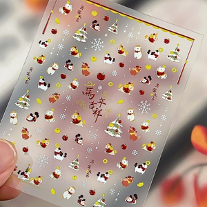 Stickers à ongles de l'année du cheval avec motifs dorés festifs et éléments de Noël