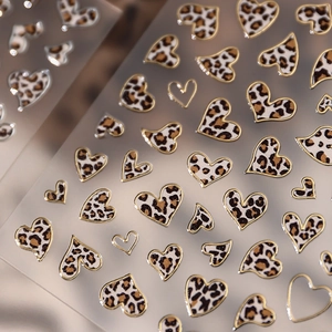 Gold leopard print heart nail art stickers with metallic edges for manicures