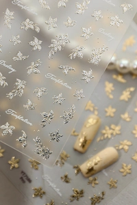Macro detail of YT7586 gold and silver floral 3D embossed nail art stickers