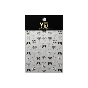 Gold bronzing bow nail art stickers with various black and white designs on sheet