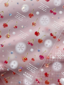 Macro detail of YT7603 cherry and snowflake 3D embossed nail stickers for winter