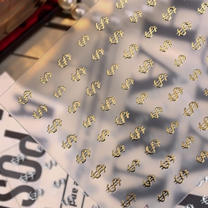 Glossy gold US dollar sign nail art stickers with metallic finish for luxury manicure