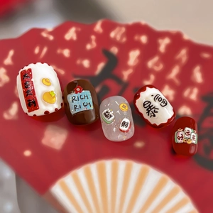Chinese New Year 3D embossed nail stickers featuring Mahjong and Daruma lucky symbols
