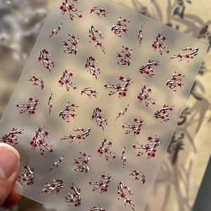 Gold-stamped winter plum nail art stickers with traditional Chinese red floral patterns