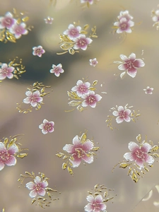 Detailed macro view of 5D pink flower nail stickers with metallic gold outlines