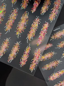 Detailed view of 5D embossed nail stickers featuring laser holographic fireworks patterns