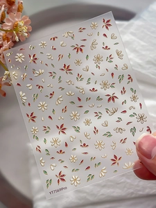 Macro view of 3D embossed floral nail stickers YT7569Pro with gold foil flower accents