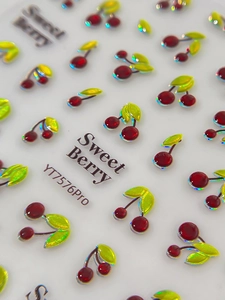 Detailed macro view of 3D cherry nail stickers with holographic glitter and resin finish