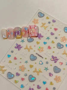 Dettagli di adesivi per unghie a forma di cane palloncino con motivi floreali olografici