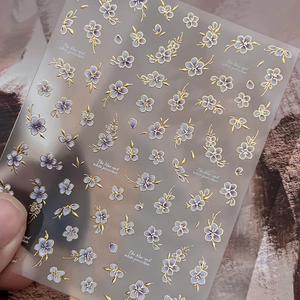 5D embossed blue and white porcelain floral nail stickers with gold edges and 3D textures