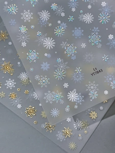 Détails d'autocollants pour ongles flocon de neige argentés et dorés avec effet holographique