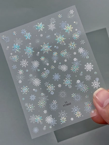 Autocollants à ongles flocons de neige holographiques aux motifs variés effet laser
