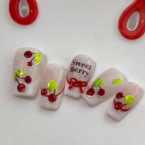 3D cherry and bow nail art charms on white gradient press-on nails with sweet berry design