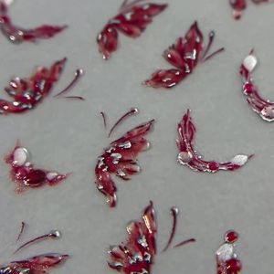 3D butterfly nail art stickers in deep red and silver glitter for sweet manicure designs