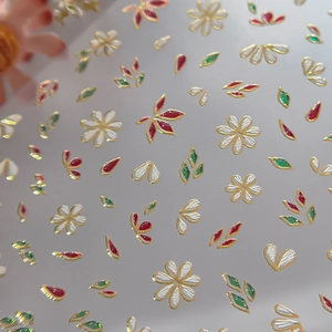 Floral nail art stickers with gold stamping and white petals for autumn manicure decor
