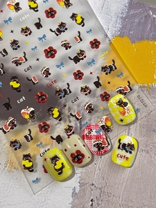 Vue détaillée de stickers ongles 5D en relief avec chats noirs mignons et fleurs
