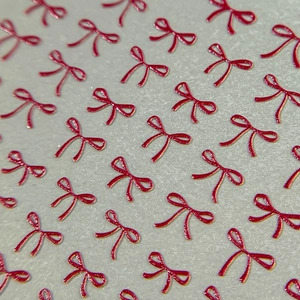 Stereo red bow nail art stickers with gold edges and frosted relief texture