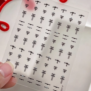 Traditional Chinese knot style nail art stickers with white pearls on transparent film