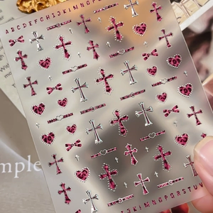 Y2K nail stickers featuring pink leopard hearts, crosses, and bows in sweet gothic style
