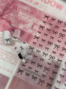 Macro de stickers pour ongles avec nœuds 3D roses et noirs et motifs de dentelle