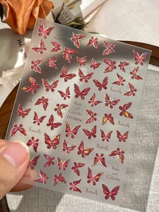 Detailed 3D butterfly nail stickers with holographic glitter finish and relief texture