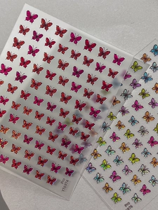 Detailed close-up of YT6974 butterfly nail art stickers with glitter laser effects