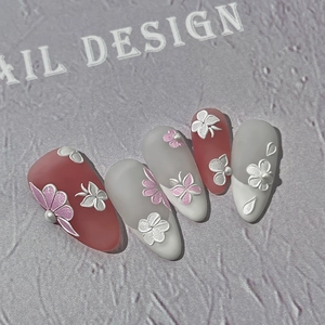 3D embossed floral nail stickers with coral red and matte white tips with pearls