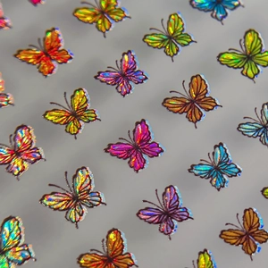 Holographic butterfly nail art stickers with metallic laser effect in various colors