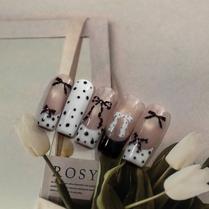 Pink press-on nails with black polka dots, French tips and 3D bow charms set