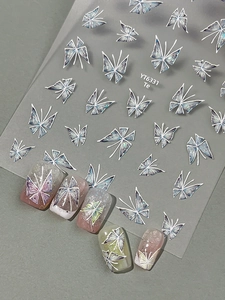 Detailed holographic butterfly nail art stickers with 3D embossed texture on various colors