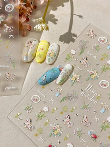 Close-up of 5D floral nail stickers with horse patterns and spring flower designs