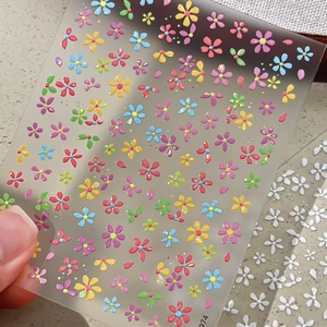 Autocollants nail art floraux avec fleurs colorées et effet de paillettes laser