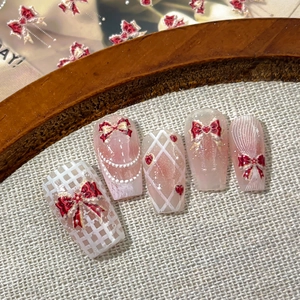 Baroque style bow nail stickers with red hearts and pearls on elegant trapezoid nails