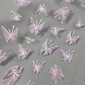 Purple hand-painted butterfly nail art stickers with gradient glitter finish