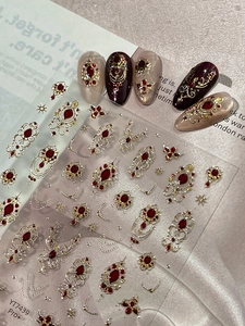 Baroque nail art stickers featuring ruby textures and gold embossed patterns YT7439