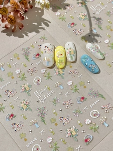 3D relief nail stickers featuring spring flowers and cartoon horses on manicure tips