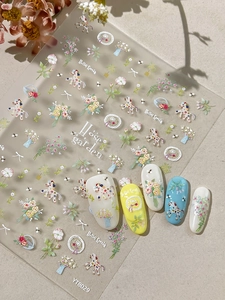 Detailed view of YT8029 3D embossed nail art stickers with spring floral and pony designs