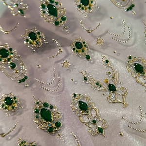 Baroque style nail stickers featuring gold gilded scepter and emerald gemstone designs