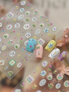 Detailed 3D floral nail stickers featuring tulips and bows on various colorful tips