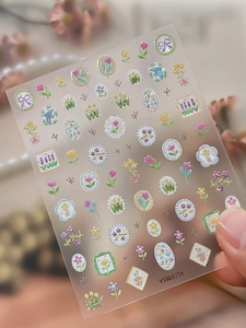 Macro shot of 5D floral nail decals with embossed lavender and tulips, item YT8051Te