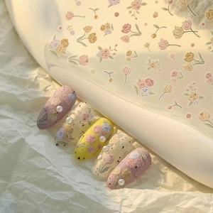 Floral tulip nail art stickers with 3D embossed flower patterns and pearl accents
