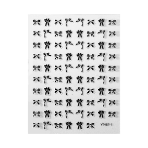 Cute black bow nail art stickers set with various styles and self-adhesive patterns