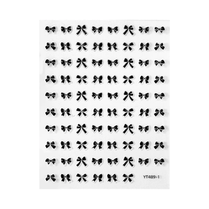 Self-adhesive black ribbon bow nail art stickers set with gloss finish on white base